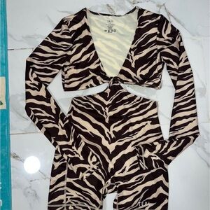 Active by Teal | Tiyana Jumpsuit in Dark Zebra